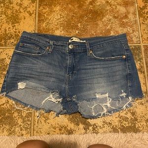 Levis womens 11 mid low rise jean shorts disstressed hand cut